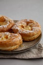 Homemade Paris Brest on a Plate, side view. Close-up