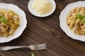 Homemade Pasta carbonara Italian with Bacon, eggs, Parmesan Cheese on white plate on a dark background. Royalty Free Stock Photo