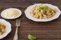 Homemade Pasta carbonara Italian with Bacon, eggs, Parmesan Cheese on white plate on a dark background. Royalty Free Stock Photo