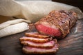 Homemade pastrami beef on a wooden Board top view Royalty Free Stock Photo