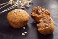 Homemade pastries cake and oatmeal on a dark black stone table background