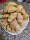 Homemade pastry. The rugelach with jam in a plate. Homemade holiday cookie. Bagels. Croissants