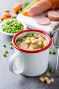 Homemade pea soup with sausage and croutons Royalty Free Stock Photo