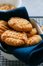 Homemade peanut butter cookies on a wire rack. Gray background. Royalty Free Stock Photo