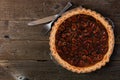 Homemade pecan pie, top view over wood Royalty Free Stock Photo