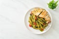 Penne pasta in pesto sauce with grilled chicken Royalty Free Stock Photo