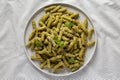 Homemade Pesto Twist Pasta on a plate, overhead view. Top view, from above, flat lay Royalty Free Stock Photo