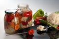 Homemade pickle of pickled vegetables in a glass jar