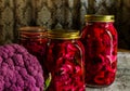 Homemade pickle with purple cauliflower in jars