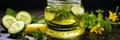 Homemade pickled cucumbers in glass jar with vinegar drop. Banner, copy space for text