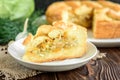 Homemade pie with cabbage, carrot, onion and meat on wooden background Royalty Free Stock Photo