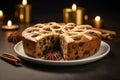 AI generated.Homemade pie with cinnamon and raisin on a dark wooden background with candles Royalty Free Stock Photo