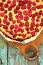 Homemade pie with organic raspberries topview