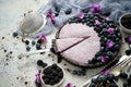 Homemade piece of delicious blueberry, blackberry and grape pie cut from a tart served on table. Royalty Free Stock Photo