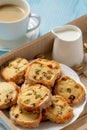 Homemade pistachio butter cookies and cup of coffee.