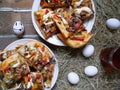 homemade pizza, cup of tea, eggs on the table Royalty Free Stock Photo
