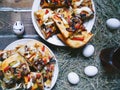 Homemade pizza, eggs and a cup of tea Royalty Free Stock Photo