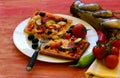 Homemade pizza with fresh tomatoes, peppers, olives, mushroom and cheese Royalty Free Stock Photo