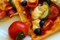 Homemade pizza with fresh tomatoes, peppers, olives, mushroom and cheese Royalty Free Stock Photo