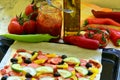 Homemade pizza with fresh tomatoes, peppers, olives, mushroom and cheese Royalty Free Stock Photo