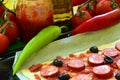 Homemade pizza with fresh tomatoes, peppers, olives, mushroom and cheese Royalty Free Stock Photo