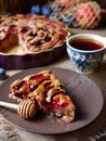 Homemade plum cake zwetschgendatschi, damsonpie on the ceramic plate. Rustic style. Royalty Free Stock Photo