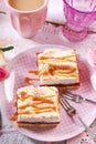 Homemade plum cale with meringue and caramel