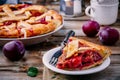 Homemade plum pie on rustic background Royalty Free Stock Photo