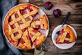 Homemade plum pie on rustic background Royalty Free Stock Photo