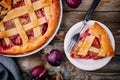 Homemade plum pie on rustic background Royalty Free Stock Photo