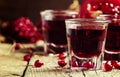 Homemade pomegranate liqueur, still life in rustic style, vintag Royalty Free Stock Photo