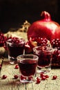 Homemade pomegranate liqueur, still life in rustic style, vintag Royalty Free Stock Photo