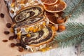 Homemade poppy seeds cake and spruce branches, dessert for Christmas Royalty Free Stock Photo