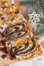 Homemade poppy seeds cake and spruce branches, dessert for Christmas Royalty Free Stock Photo