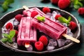 Homemade popsicles with fresh berries and ice on rustic background, Homemade raspberry popsicles on plate with ice and berries, AI