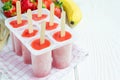 Homemade popsicles with strawberry and banana