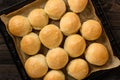 Homemade potato bread rolls on wooden tray. Royalty Free Stock Photo