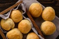 Homemade potato bread rolls on wooden tray. Royalty Free Stock Photo