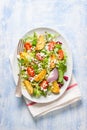 Homemade potato salad with fresh vegetables and oven baked potato Royalty Free Stock Photo