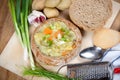 Homemade potato soup in loaf of bread Royalty Free Stock Photo