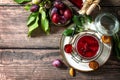 Homemade preservation. Delicious plum jam on a rustic wooden table. Top view flat lay background. Copy space. Royalty Free Stock Photo