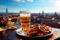 Homemade pretzels and glass beer on the background of a German city. Oktoberfest Symbols Royalty Free Stock Photo