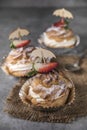 Homemade profiteroles with cream, strawberries and mint. Dessert for gourmets Royalty Free Stock Photo