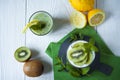 Homemade proteic greek yogurt with kiwi, lemon and mint and healthy shack of kiwi, banana and lemon Royalty Free Stock Photo