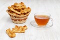 Homemade puff pastry. Plait cookies and cup of tea.