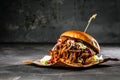 Homemade pulled pork burger with bbq sauce close up. Royalty Free Stock Photo