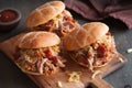Homemade pulled pork burger with caramelized onion and bbq sauce Royalty Free Stock Photo