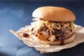 Homemade pulled pork burger with coleslaw and bbq sauce