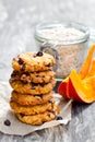 Homemade pumpkin and orange cookies on rustic wooden background Royalty Free Stock Photo