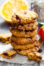 Homemade pumpkin and orange cookies on rustic wooden background Royalty Free Stock Photo